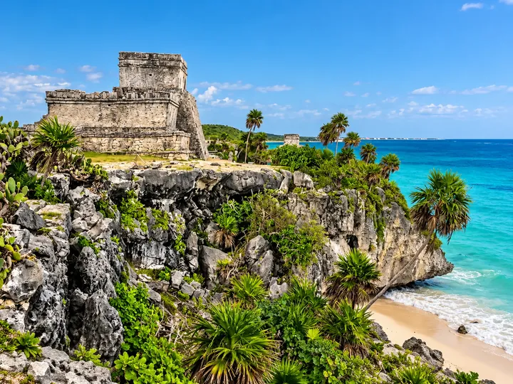 Tulum temple on its cliff above the Caribbean Sea.